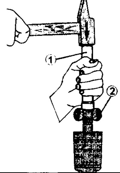 7.49 Drive the coupling of the hinge 2 onto the shaft, placing on its end head 1 of the…