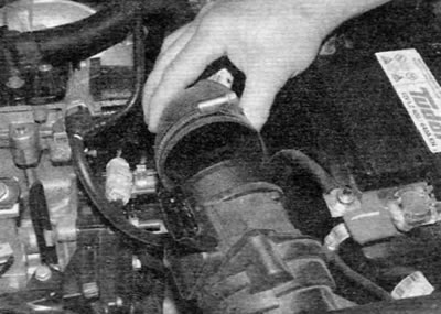 Figure 20.20. Loosen the clamp and disconnect the intake air duct from the air flow sensor (2.0 L…