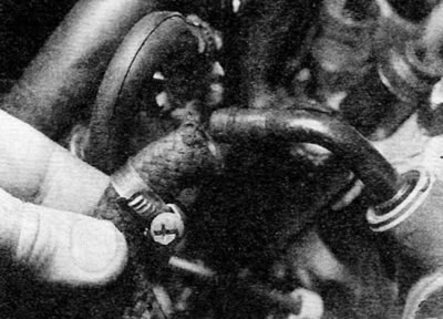 Figure 13.4. Disconnecting the vacuum hose from the brake system vacuum pump