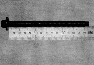 Figure 13.31. Measure the length of the bolt to determine if replacement is required