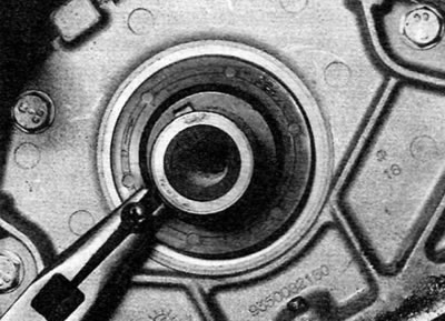 Figure 16.3. Using a self-tapping screw and pliers to remove the right crankshaft oil seal