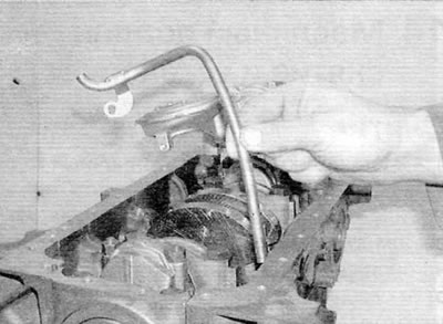 Figure 15.2, b....then remove the guide tube from the cylinder block (shown with the engine removed)