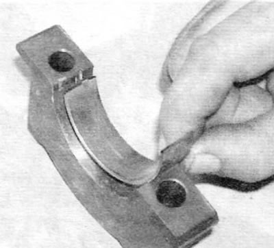 Figure 18.4, b....and in the bearing cap