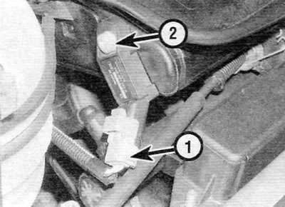 Figure 13.43. Disconnect the manifold pressure sensor electrical connector (1), and then remove the…
