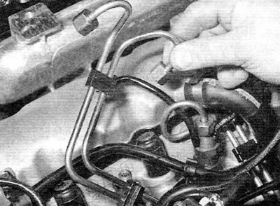 Figure 5.12, d. Removing the fuel line kit