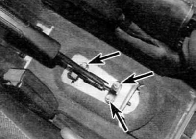 Figure 15.7. Release the parking brake cable housing from the brake shield