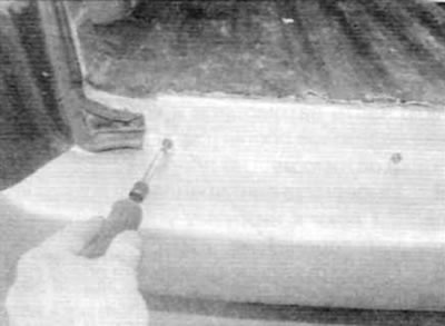 Figure 7.7. Remove the screws securing the top edge of the bumper to the bumper bracket