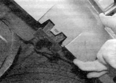Figure 7.8. Release the retaining clips on the lower edge of the bumper from the support brackets