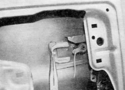Figure 14.7. Remove the larger horseshoe clamp from the back of the lock cylinder