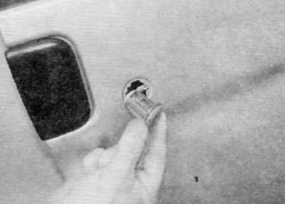 Figure 14.8. Remove the lock cylinder and rod from the outside of the door