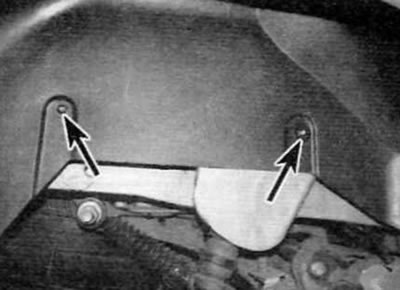 Figure 23.5. Unscrew the two nuts (marked with arrows) fastening the rear wheel arch liner to the…