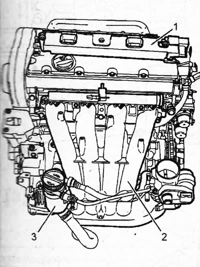 1.0b. Motor EW10J4 1 - blok zavojnice paljenja; 2 - usisni razvodnik s nosačem za montažu leptira…