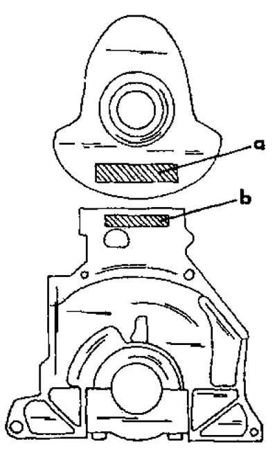 Фигура 73. Ако е монтиран модифициран колянов вал, има маркировки на посочените места.