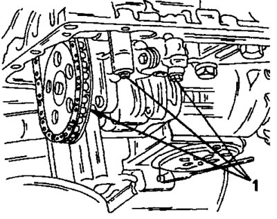 Рис. 150. Болты крепления (1) на нижней стороне картера двигателя.