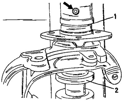 Рис. 224. Запрессовка ступицы колеса. Перед опусканием пуансона (1) подставить подкладку (2) под…