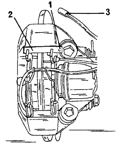Рис. 257. Снятие и установка тормозных колодок на тормозной суппорте Bendix. 1. Пружинная планка;…