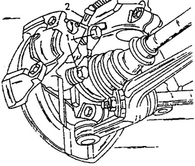 Рис. 264. Крепление тормозного суппорта на поворотном кулаке. Стрелками (1) указаны болты…
