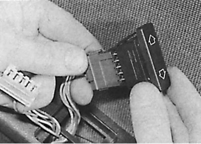 5. On models with a manual window lift, remove the window handle from the shaft and the gasket.
