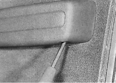 7. Remove the decorative cover of the outside mirror.