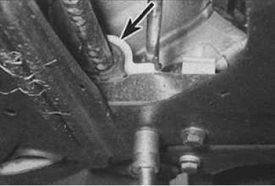 3. Remove the bolts and nuts securing the stabilizer bar link to the top of the lower frame…