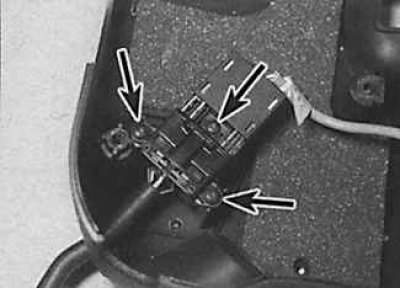 2. Unscrew the mounting screws (indicated by arrows) and remove the cruise control switch from the…