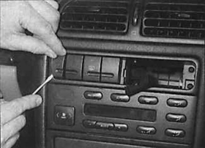 2. Remove the switch bezel.